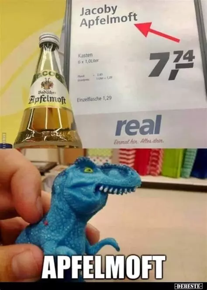 Image of a retail price sign, labeled "Jacoby Apfelmoft", in front of a bottle of the product, labeled "Apfelmost" in German Frakturschrift, in front of it a blue dinosaur toy with the lower jaw curly-overbitten by the upper jaw, with a meme text in front APFELMOFT